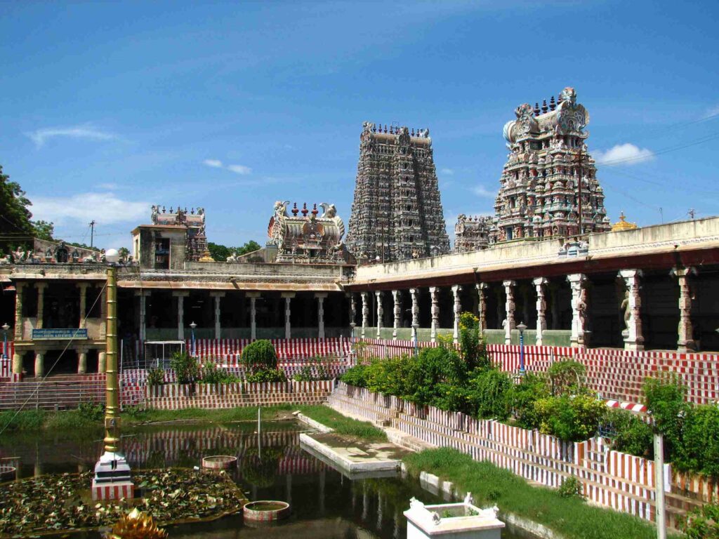 Meenakshi Amman Temple with a pond and statues