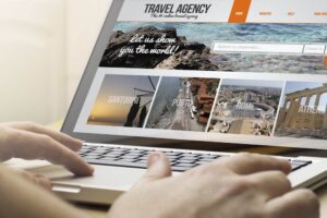 searching on laptop for a travel agency